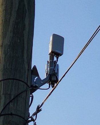 K60 radio on utility pole — wide shot